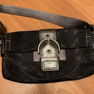 Small black coach purse. Great condition.